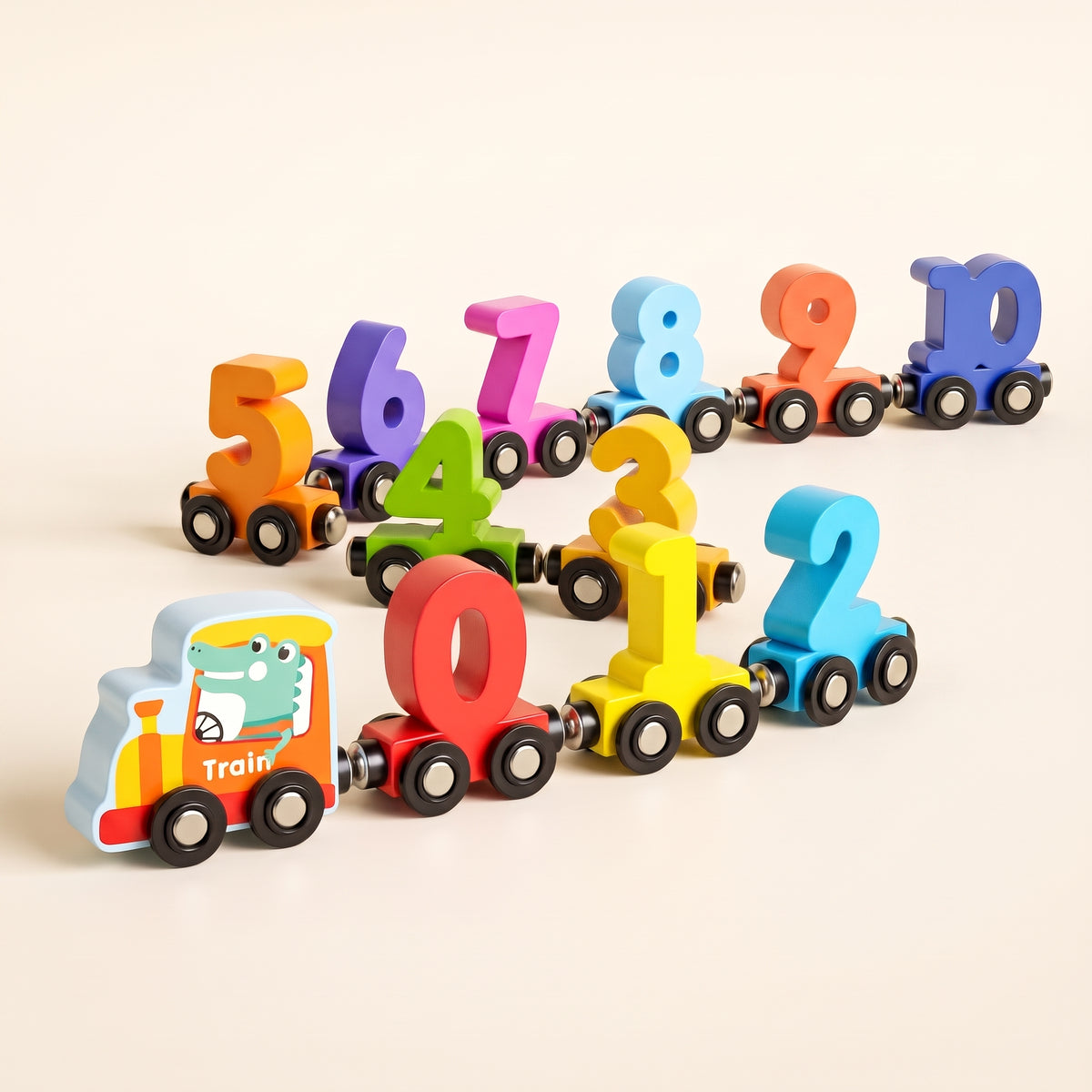 Wooden magnetic number train with a crocodile engine and colourful number wagons from 0 to 10 on a cream background
